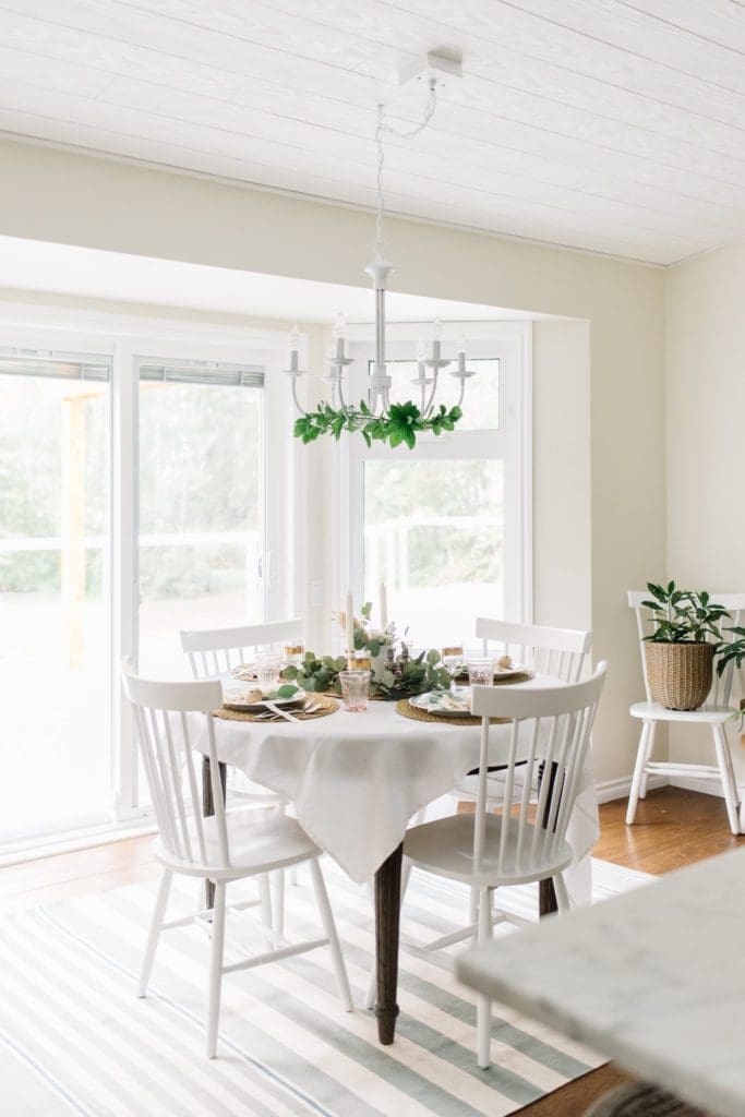 A light bright dining nook wth round table