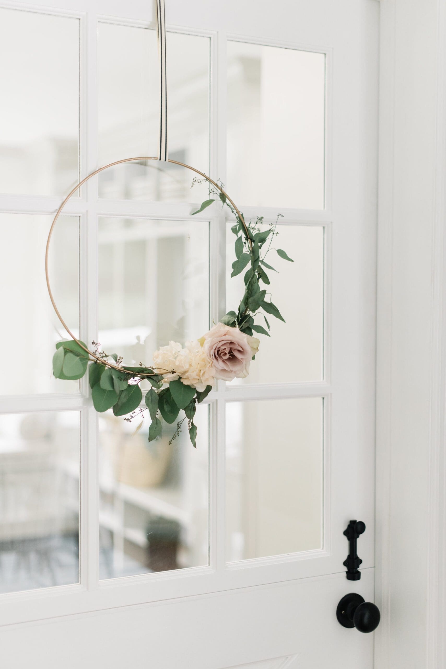 Minimal fall wreath made with gold hoop and florals