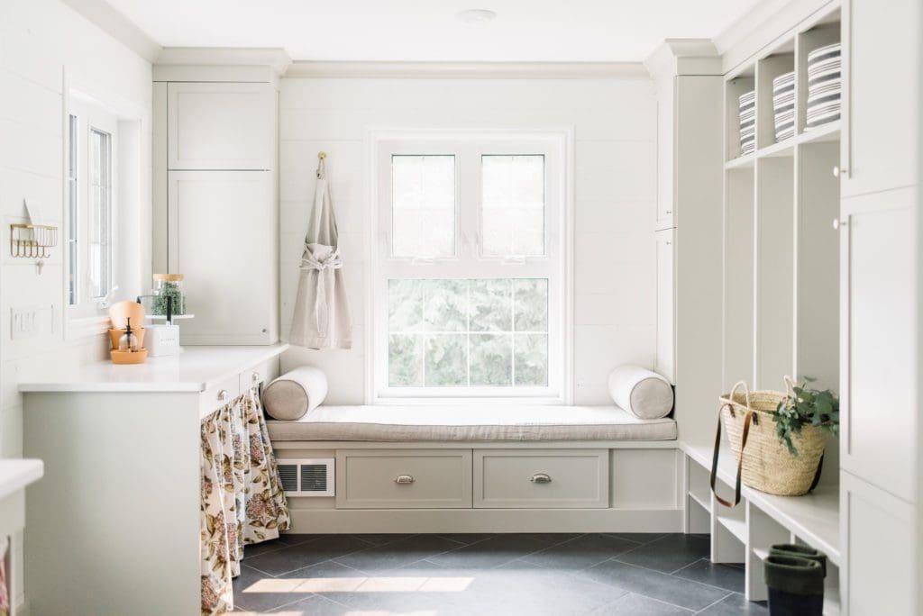 Mudroom designed with function and aesthetics in mind. Lots of built in storage was added without compromising natural light.