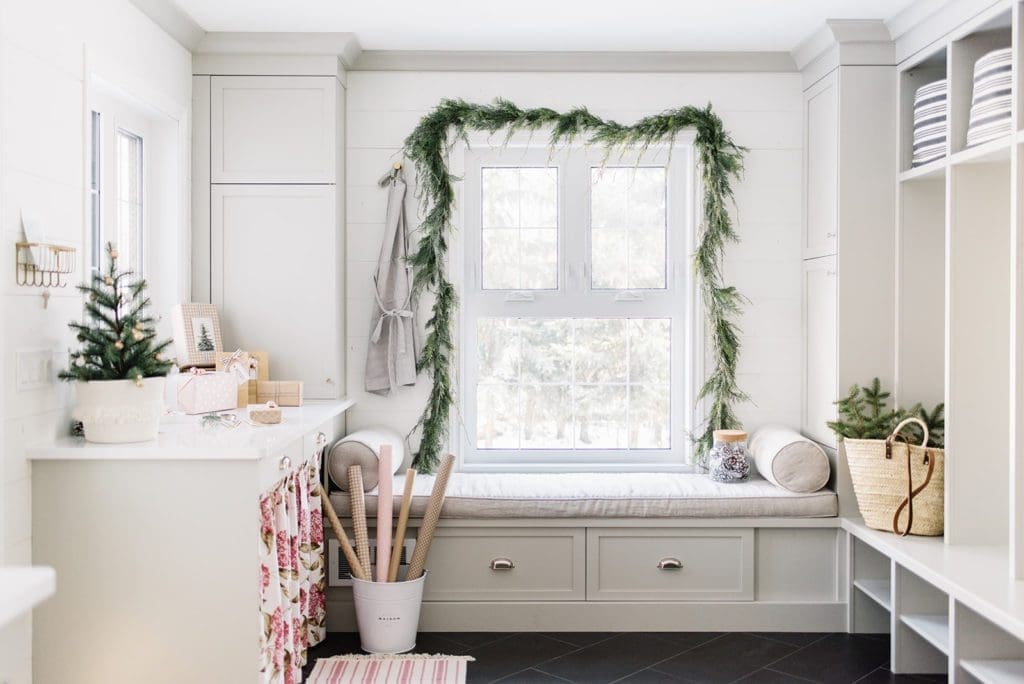Adding Christmas decor to the mudroom - set up a gift wrapping station by the door to make gift giving simple