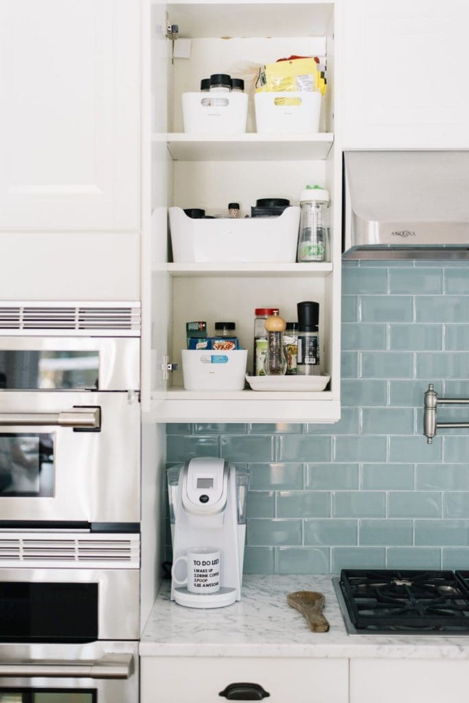 Storing pantry staples in labelled bins makes organization easy