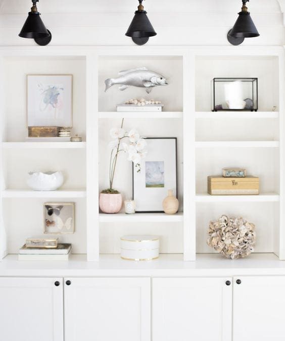 Lighting adds ambience and function to bookshelf styling