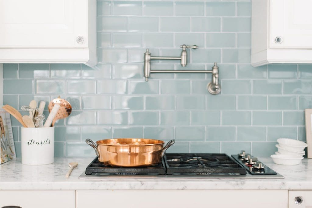 stove with stainless pot filler faucet