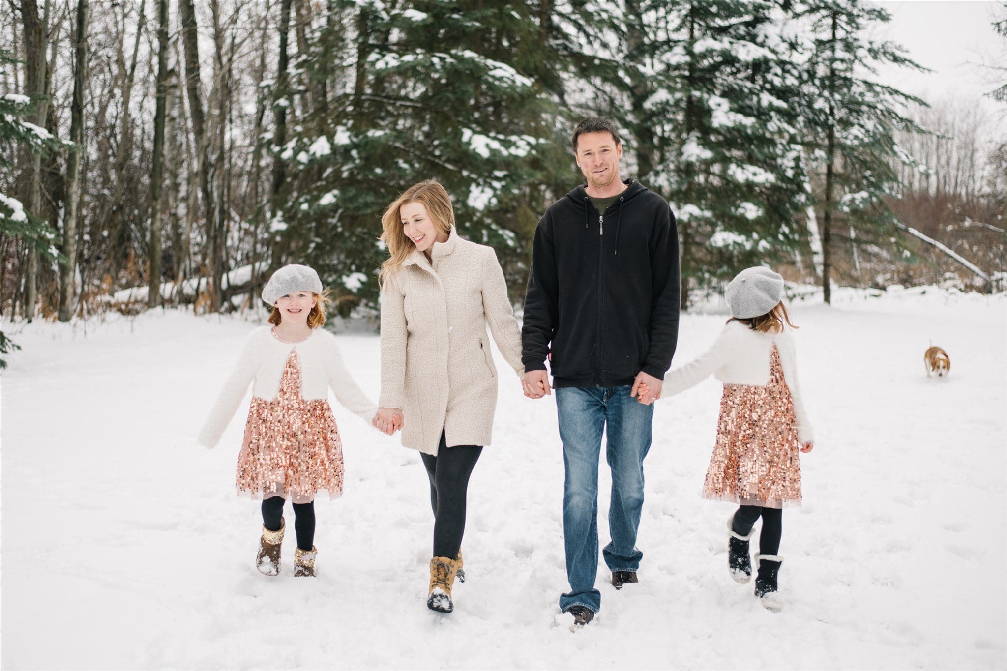Family walks in the snow