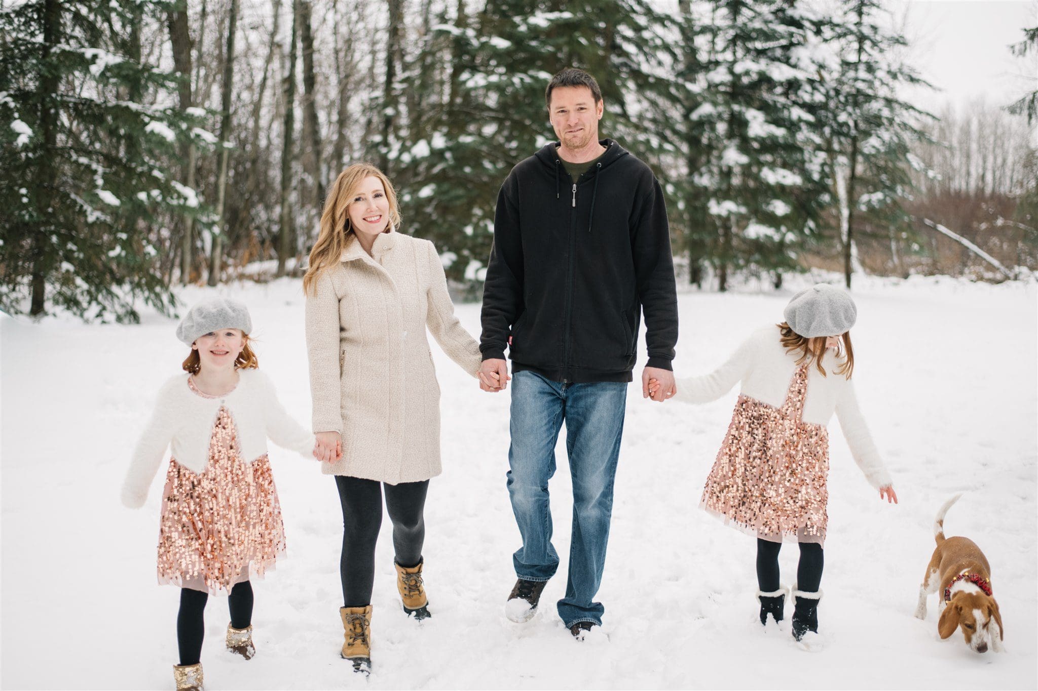 A family poses for Christmas card photos