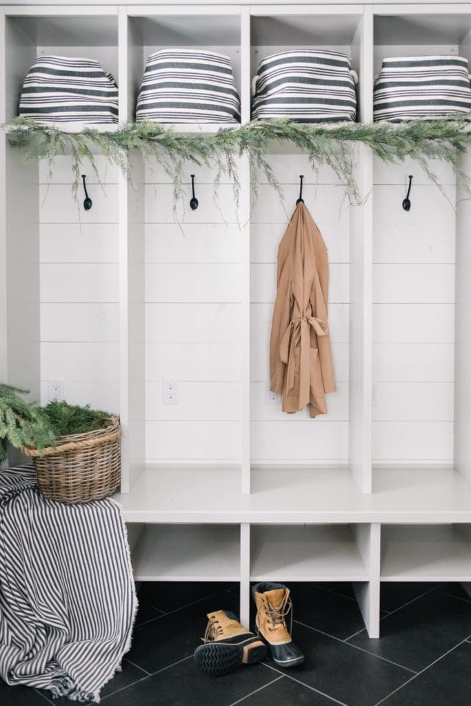 Farmhouse mudroom with Christmas greenery