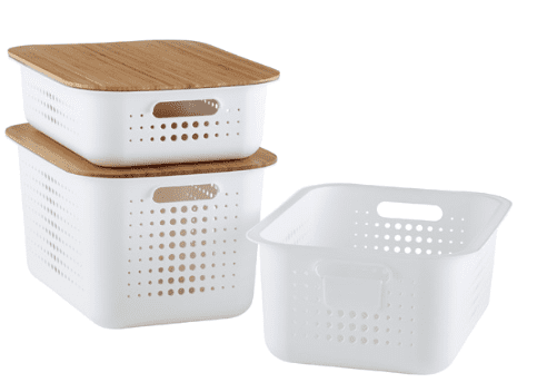 A close up of white lidded baskets