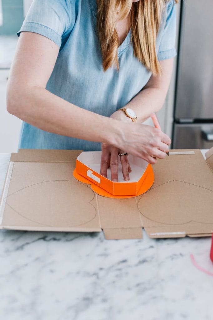 tracing hearts onto cardboard