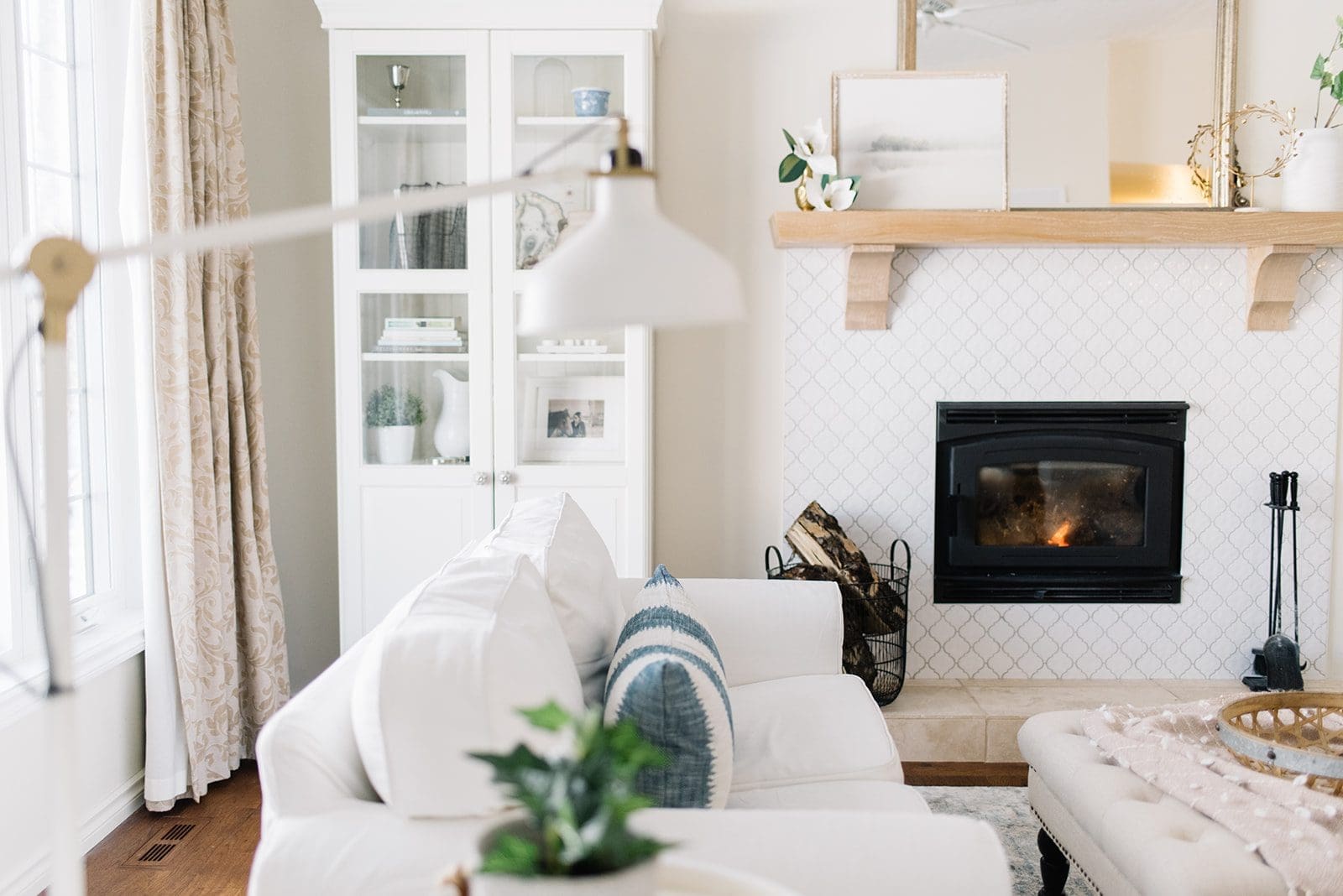 A living room filled with furniture and a fireplace