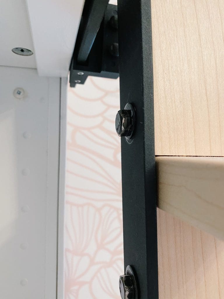 close up view of how ladder attached to hardware