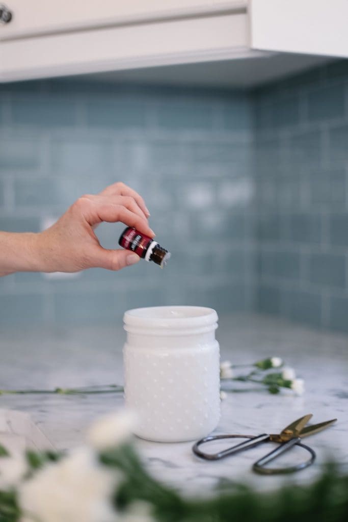 adding essential oil to flower water