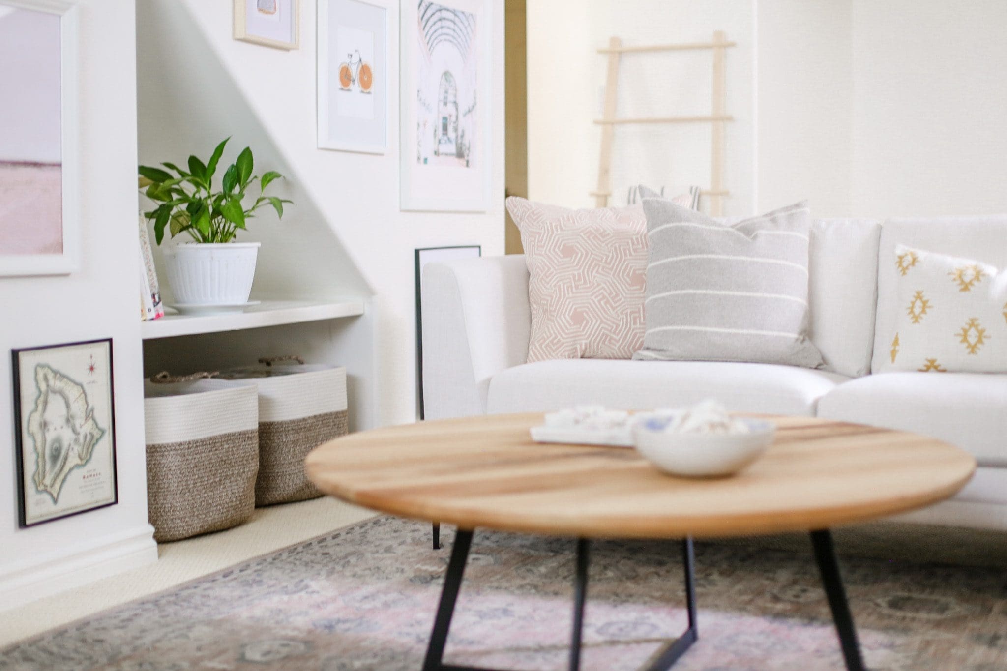 a wooden coffee table with black metal legs