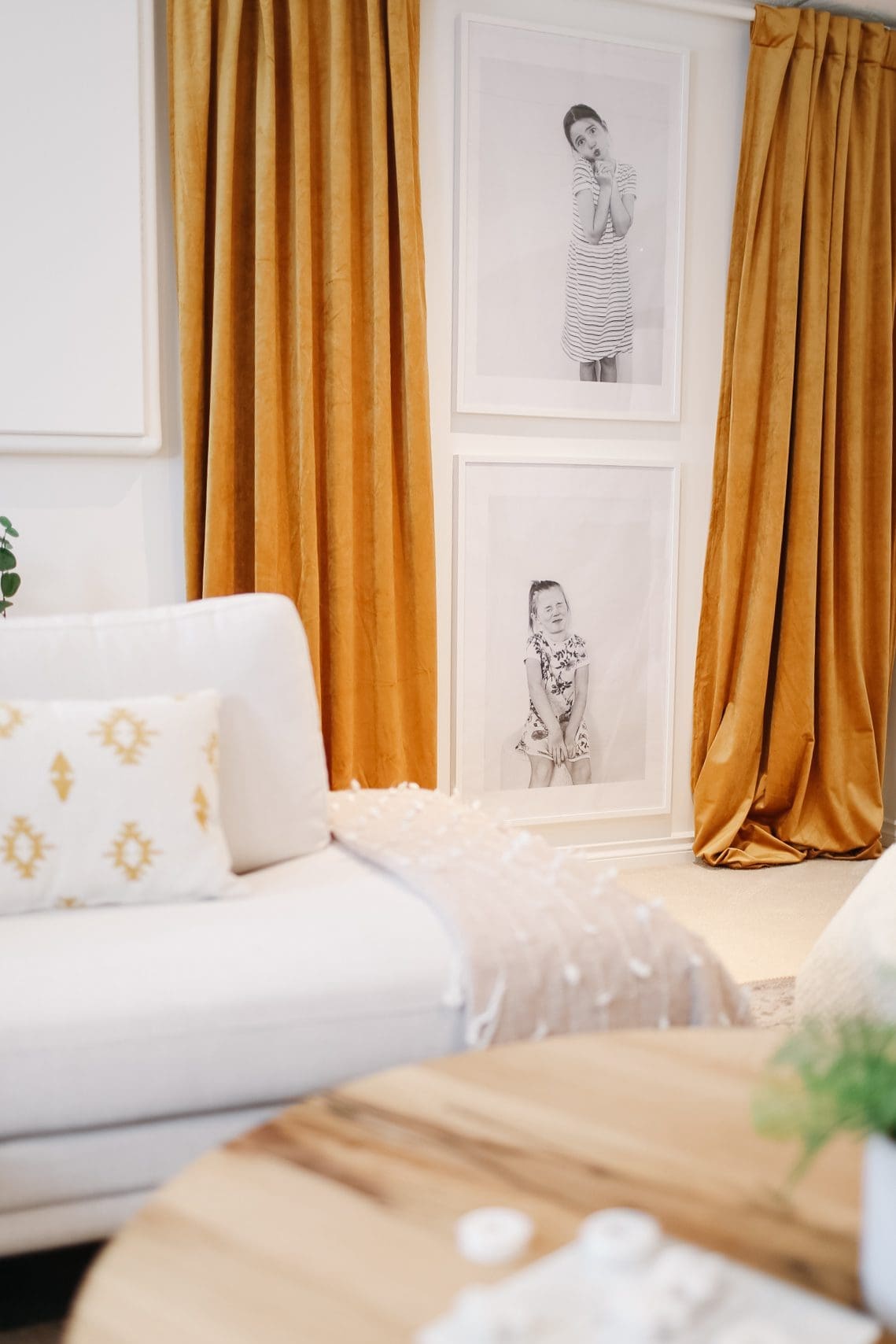Extra large printed family photos framed on the wall
