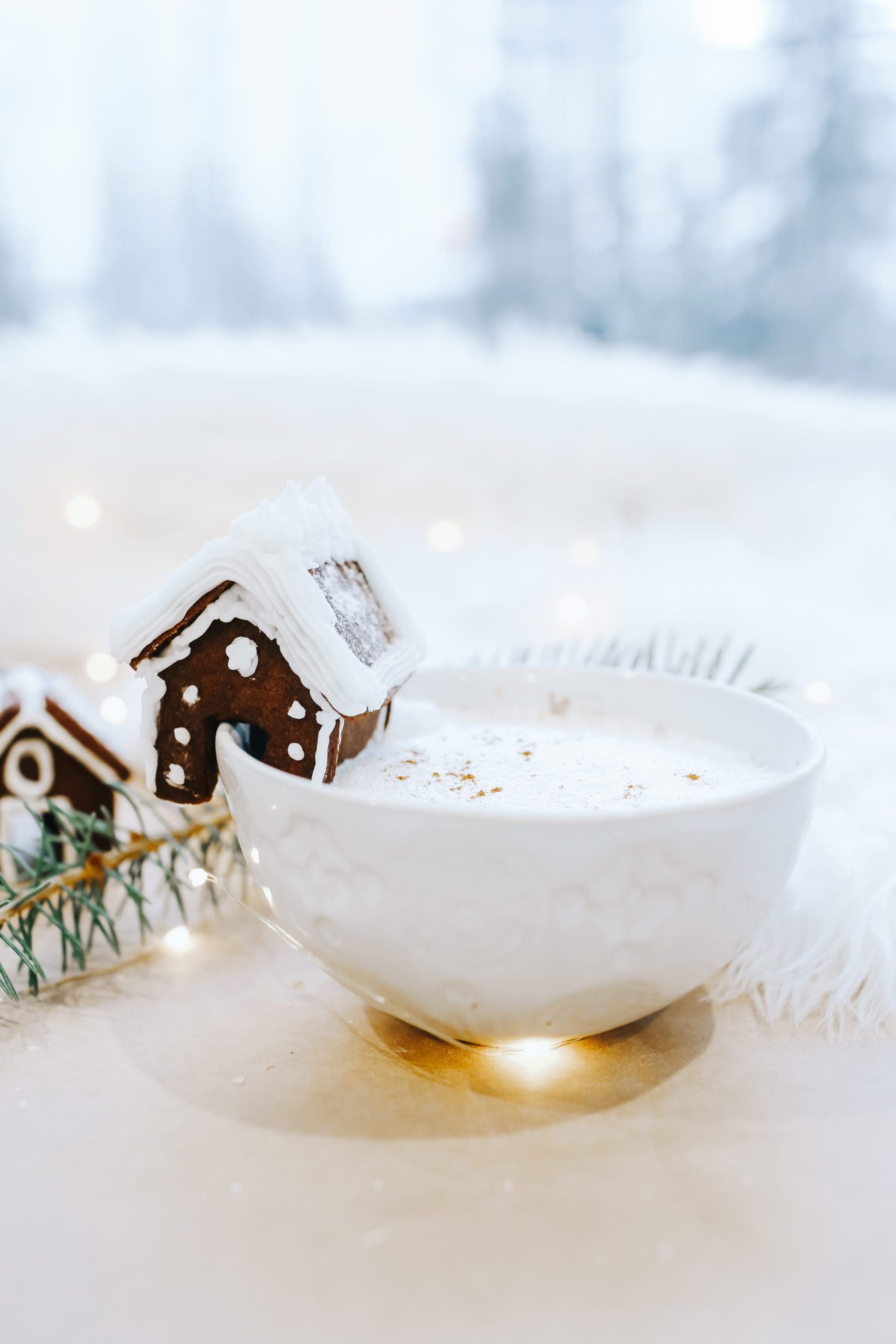 Gingerbread mug hugger on the side of a latté mug